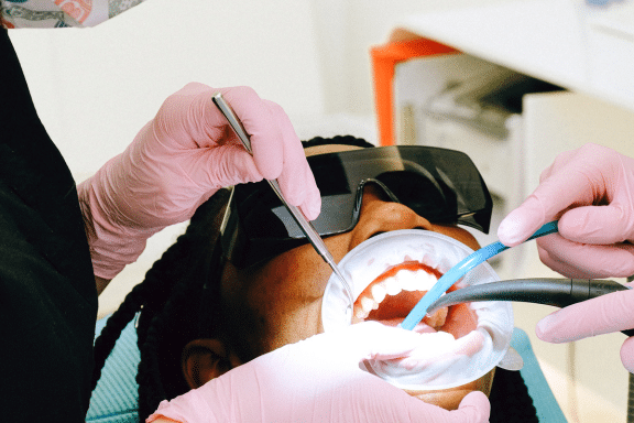 a young girl having her teeth cleaned answering how long do teeth cleanings take